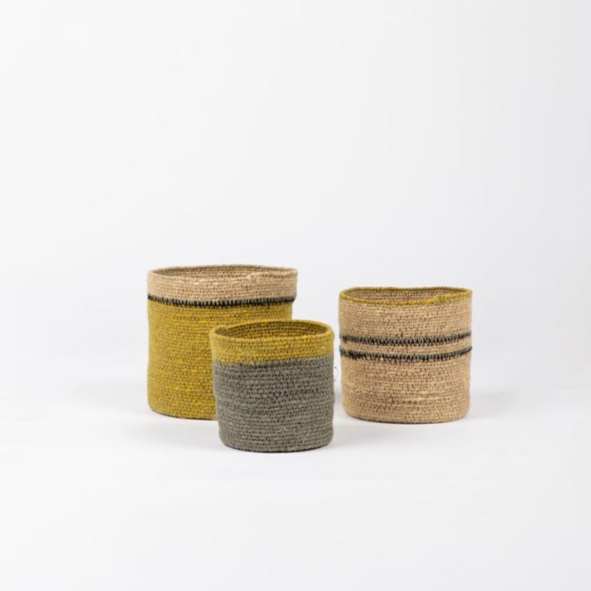 The Paco Basket Set in mustard/grey/black  is a perfect way to store objects around the home in style. Functional, beautiful and textural. Handmade in seagrass