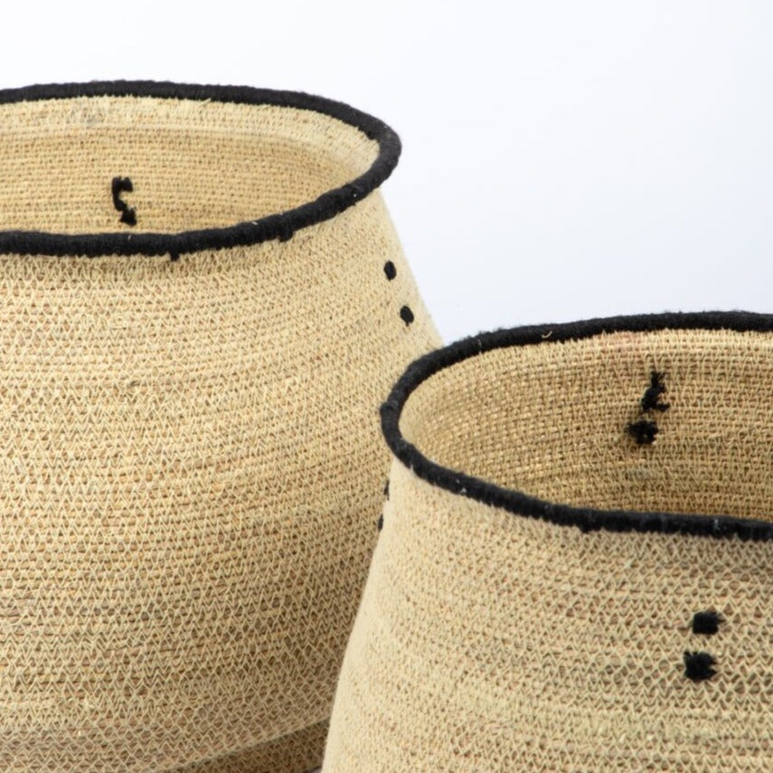 The Saraya Round Basket Set- natural is a perfect way to store objects around the home in style. Functional, beautiful and textural.