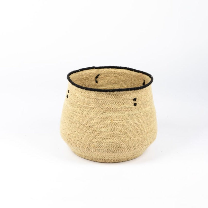 The Saraya Round Basket Set- natural is a perfect way to store objects around the home in style. Functional, beautiful and textural.